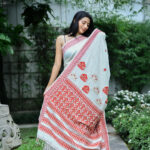 Crimson Bloom – Eri Silk Saree with Traditional Motifs